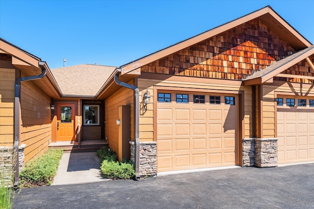 view of front of home with a garage