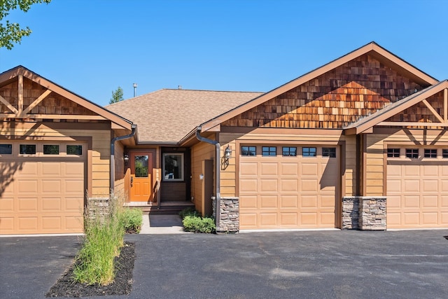 craftsman inspired home featuring a garage