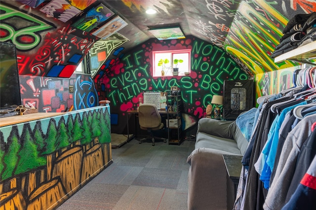 playroom featuring lofted ceiling