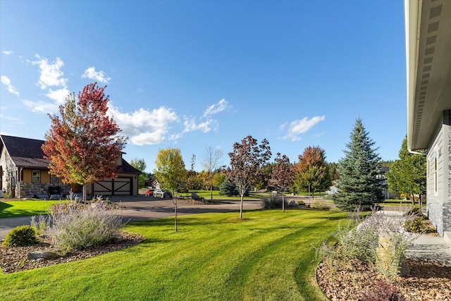 view of yard with a garage