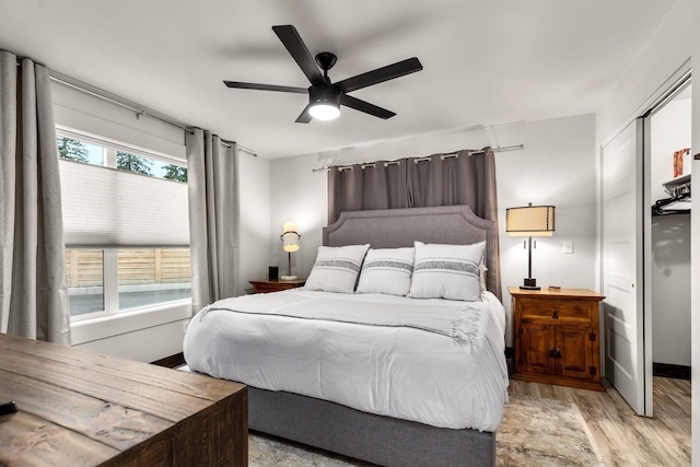 1010 7th St E Unit A, Whitefish, MT 59937 - bedroom with wood finished floors and ceiling fan