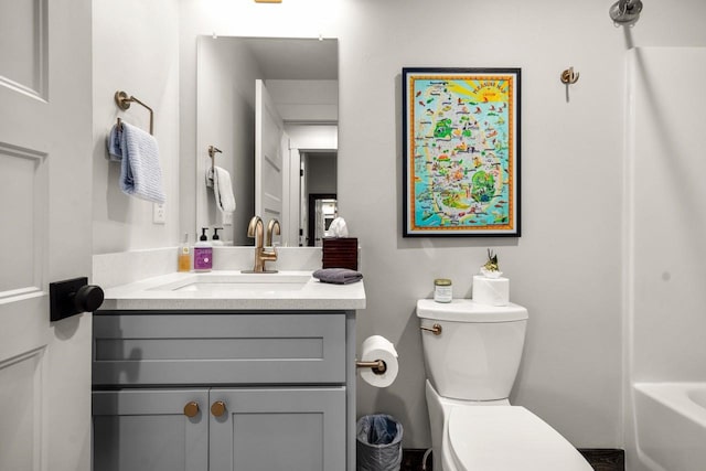 1010 7th St E Unit A, Whitefish, MT 59937 - bathroom featuring toilet, vanity, and a bath
