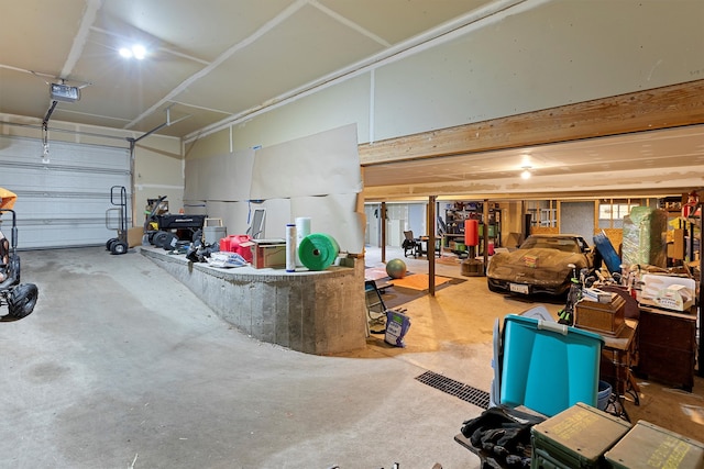 garage featuring a garage door opener