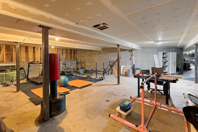 workout room with concrete flooring