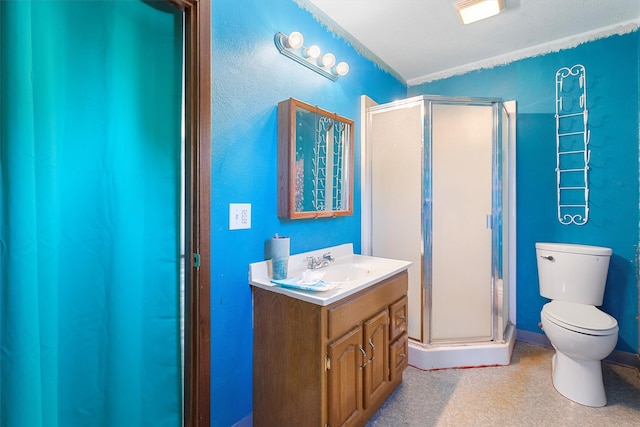 bathroom featuring vanity, toilet, and an enclosed shower