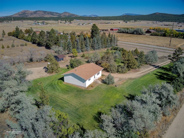 aerial view featuring a rural view and a mountain view