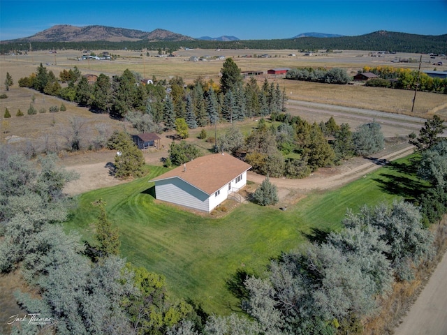 birds eye view of property featuring a rural view and a mountain view