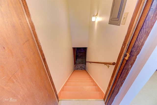 stairway featuring electric panel
