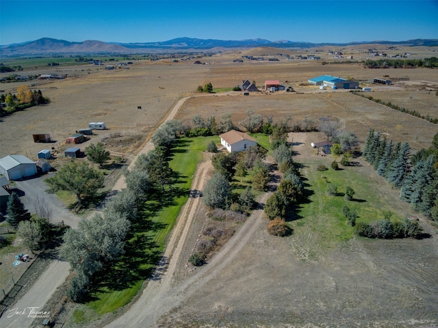 drone / aerial view with a rural view and a mountain view