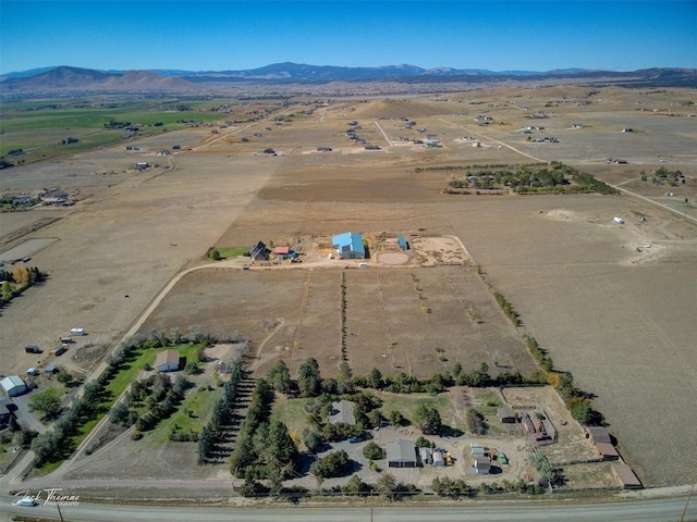 aerial view featuring a mountain view and a rural view