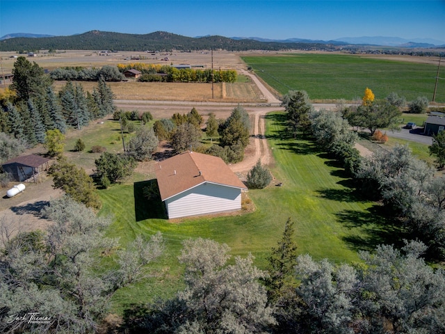 aerial view featuring a mountain view and a rural view