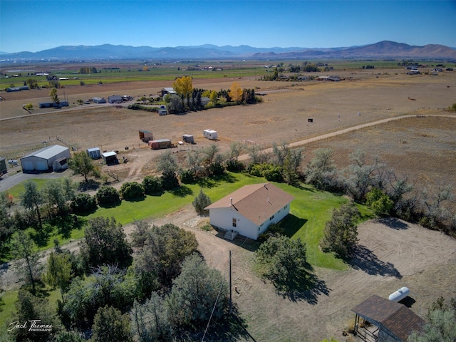 bird's eye view with a rural view and a mountain view
