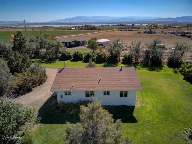 drone / aerial view with a rural view and a mountain view