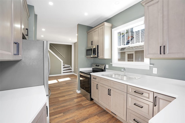 614 3rd Ave, Havre, MT 59501 - kitchen with stainless steel appliances, wood finished floors, recessed lighting, and light countertops