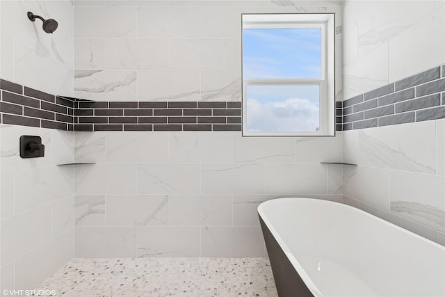 bathroom featuring a washtub