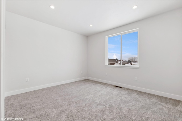 empty room with carpet floors