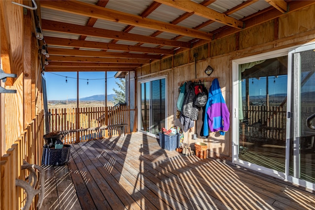 wooden deck with a mountain view