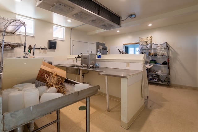 kitchen featuring white cabinets