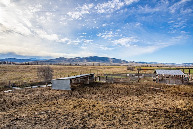 view of mountain feature featuring a rural view