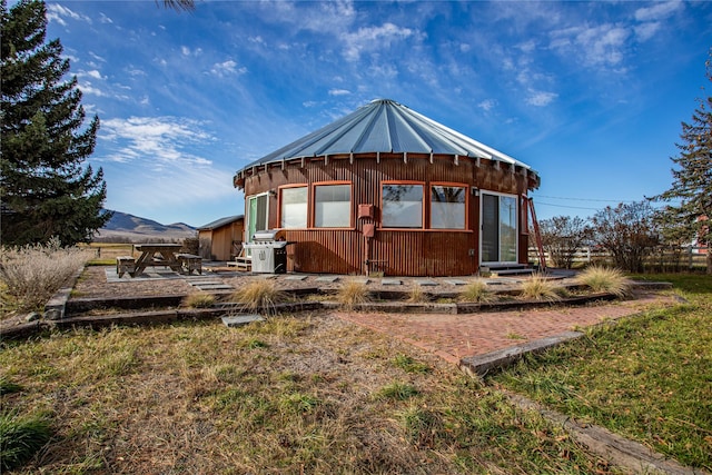 back of house featuring a patio area