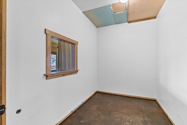 spare room with concrete flooring