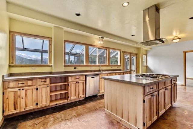 169 Brookes Dr, Rexford, MT 59930 - kitchen featuring stainless steel appliances, island range hood, dark countertops, light brown cabinets, and healthy amount of natural light
