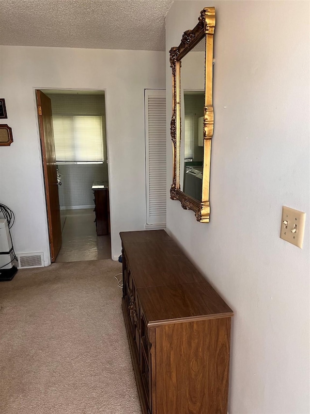 233 4th Ave SW, Cut Bank, MT 59427 - hall featuring carpet flooring and a textured ceiling