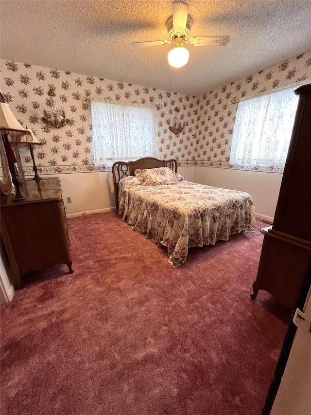 233 4th Ave SW, Cut Bank, MT 59427 - carpeted bedroom with wallpapered walls, a textured ceiling, and a ceiling fan