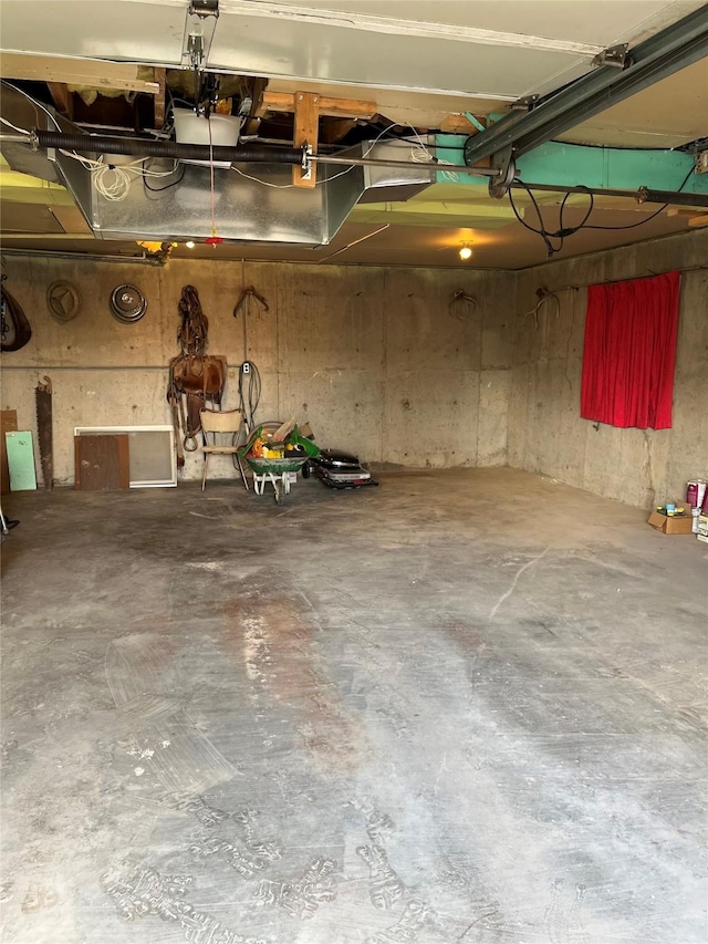 garage featuring a garage door opener