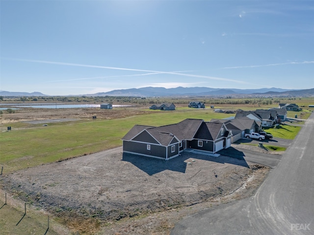 aerial view with a water and mountain view