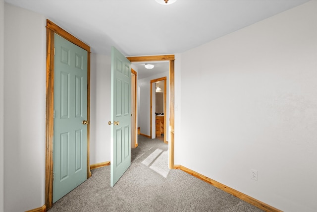 unfurnished bedroom featuring carpet