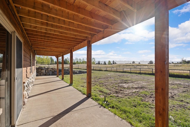 view of patio / terrace featuring a rural view