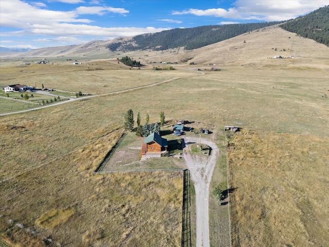 aerial view with a mountain view and a rural view