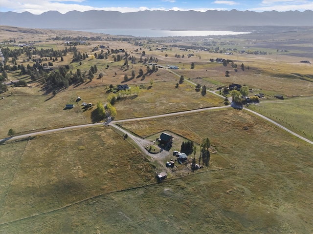 bird's eye view with a mountain view and a rural view