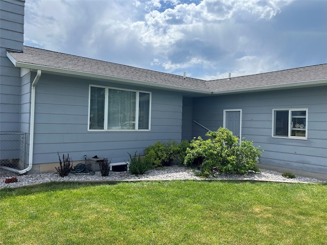 2417 S 3rd St W, Missoula, MT 59801 - back of property with a yard and a shingled roof