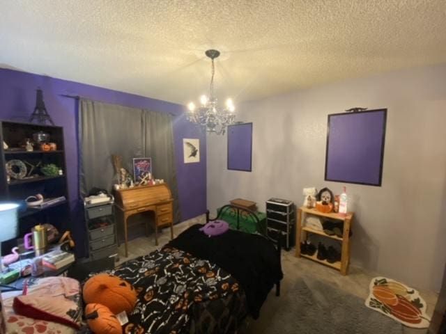 2417 S 3rd St W, Missoula, MT 59801 - carpeted bedroom with a chandelier and a textured ceiling