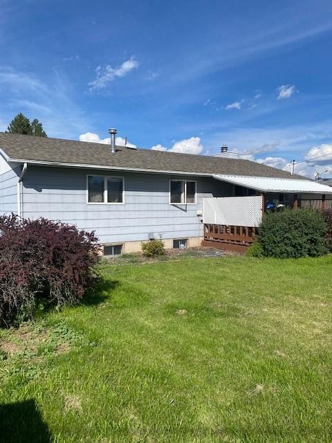 2417 S 3rd St W, Missoula, MT 59801 - back of house featuring a yard and a deck