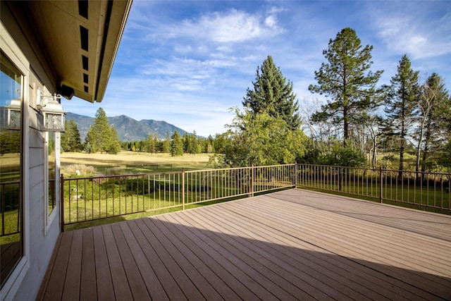 760 Trap Rd, Columbia Falls, MT 59912 - deck with a mountain view