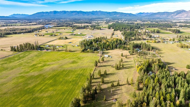 760 Trap Rd, Columbia Falls, MT 59912 - aerial view of sparsely populated area with a mountain backdrop