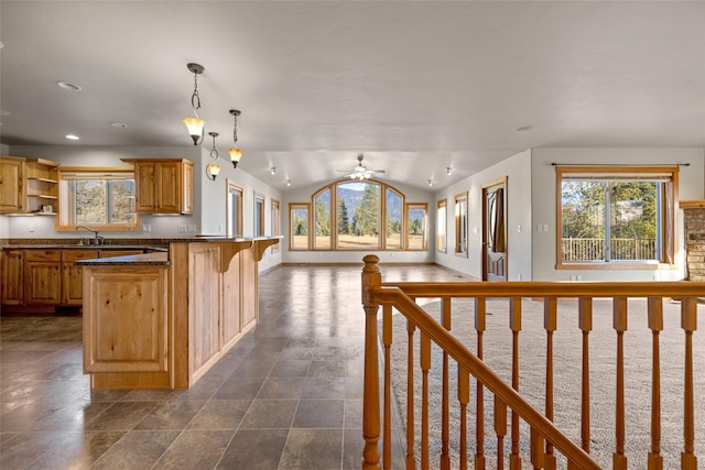 760 Trap Rd, Columbia Falls, MT 59912 - kitchen with open floor plan, a breakfast bar area, open shelves, recessed lighting, and a peninsula