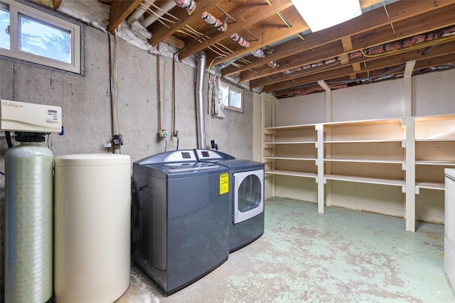 760 Trap Rd, Columbia Falls, MT 59912 - below grade area with washing machine and clothes dryer and a water softener