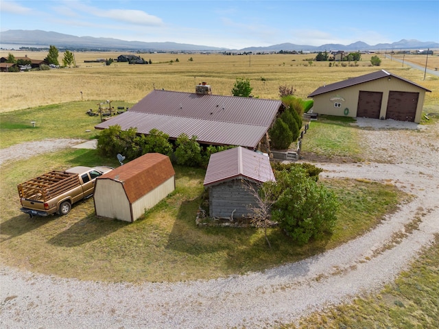 drone / aerial view with a rural view and a mountain view