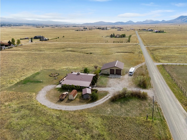aerial view featuring a rural view and a mountain view