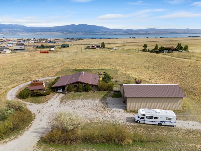 bird's eye view featuring a mountain view and a rural view