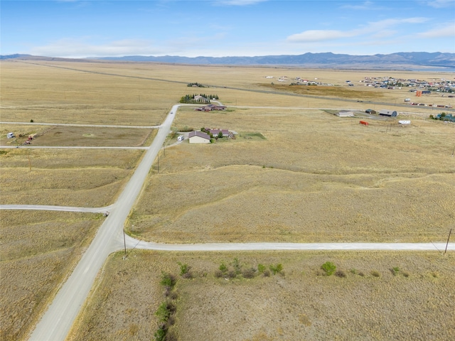 aerial view featuring a mountain view and a rural view