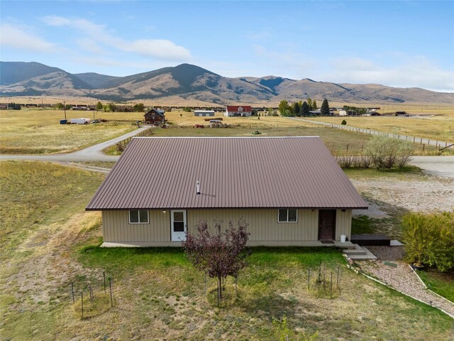 drone / aerial view with a rural view and a mountain view