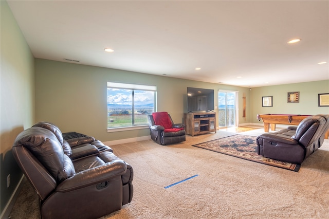 living room featuring light carpet and billiards