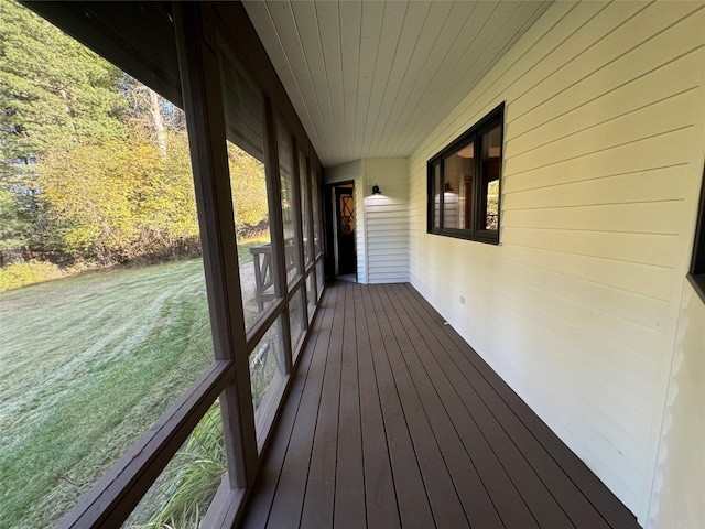 deck featuring a lawn