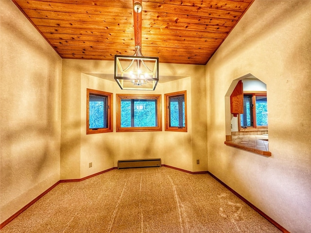 carpeted spare room featuring a baseboard radiator, baseboards, wood ceiling, and a notable chandelier