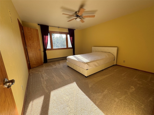 bedroom with carpet floors, baseboards, a baseboard heating unit, and a ceiling fan